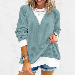 Women's casual loose color-block waffle knit sweatshirt in blue and white for autumn.