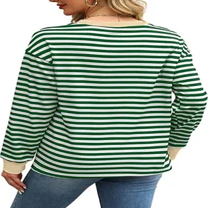 Back view of green and white striped long sleeve top with contrast beige crew neck