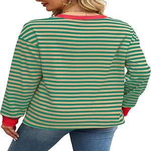 Back view of women's striped long sleeve top with green and beige horizontal patterns.