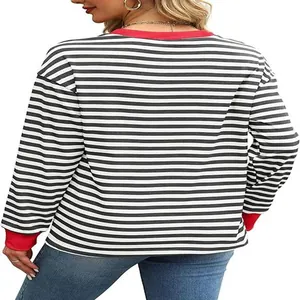 Back view of a fashionable striped long sleeve top with red collar and cuffs details