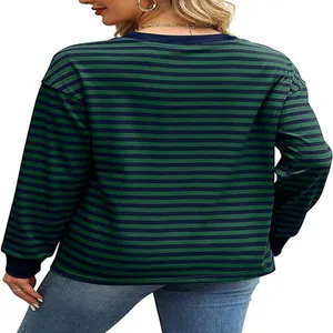 Back view of stylish women's casual loose fit green and navy striped long sleeve shirt