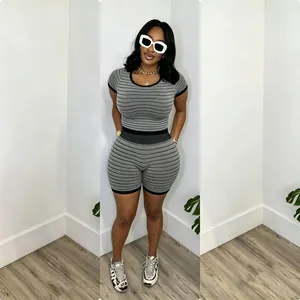 Casual women's two-piece knit set featuring horizontal fine stripes and bodycon fit