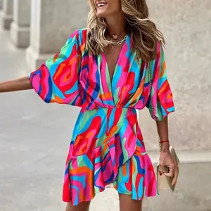 Women's summer V-neck mini dress with vibrant abstract print and batwing sleeves