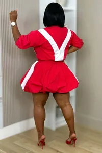 Detailed back view of a trendy red and white color-block casual bubble skirt set for women