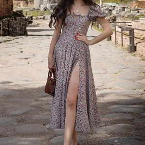 Vintage floral midi dress with square neck, puff sleeves, and sexy high slit.