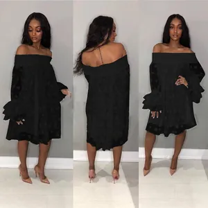 Detailed front and back views of a black off-shoulder polka dot dress with tiered ruffle sleeves