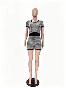 Two-piece casual knit outfit with fine black and white stripes shown on mannequin