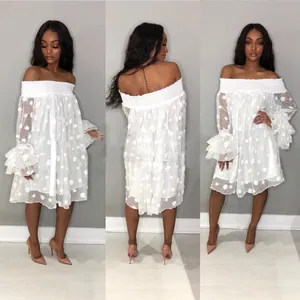 White off-the-shoulder mini dress featuring polka dot jacquard and tiered ruffled sleeves