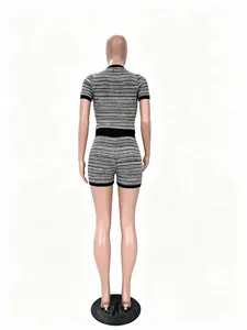 Rear view of a casual black and white striped knit shorts and top set for women