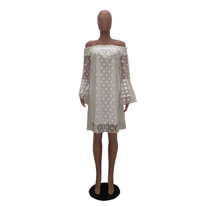 Front view of white polka dot jacquard off-shoulder dress with tiered flare sleeves