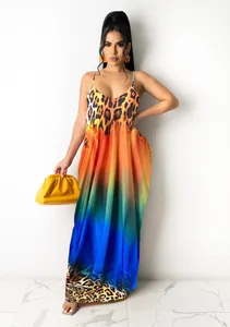 Detailed view of the vibrant rainbow gradient and leopard print on this casual maxi dress