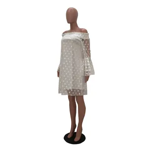 White off-shoulder polka dot dress with layered bell sleeves shown on a mannequin.