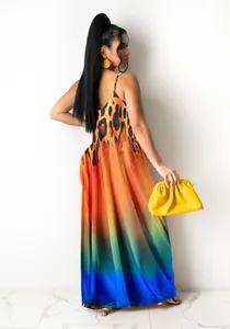 Back view of a vibrant leopard rainbow gradient printed cotton maxi slip dress