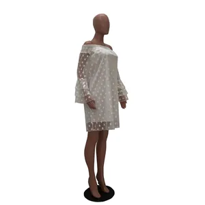 Side view of white off-shoulder polka dot jacquard dress with layered sleeves