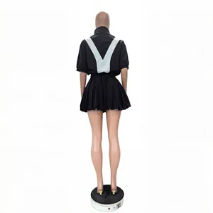 Back view of a black two-piece quick-dry bubble skirt set with a white V-panel design