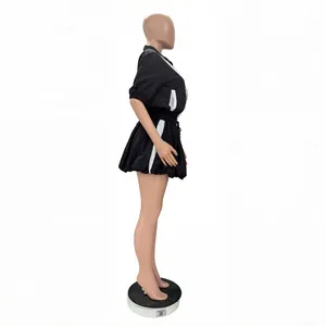 Side view of women's casual black and white color-block quick-dry bubble skirt set