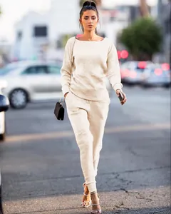 Urban casual beige knitted two-piece set worn by model in a stylish street setting