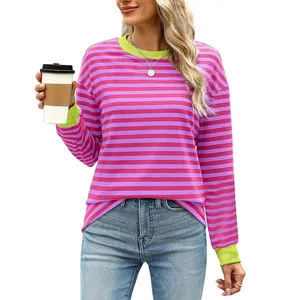 Casual women's purple and pink striped long sleeve top with neon green crew neck and cuffs.