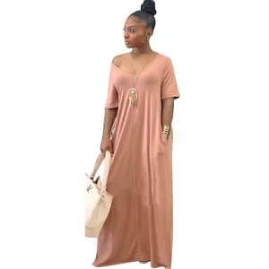 Full-length view of a dusty rose short sleeve maxi dress with functional side pockets.