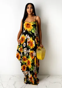 Full view of women's loose sunflower print cotton camisole maxi dress with pockets