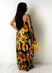 Back view of a casual loose cotton camisole dress with vibrant sunflower print