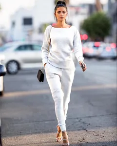Stylish light grey ribbed knit two-piece tracksuit set for women in street style view