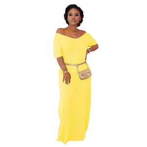 Close-up of a women's yellow off-the-shoulder short sleeve maxi dress with belt bag