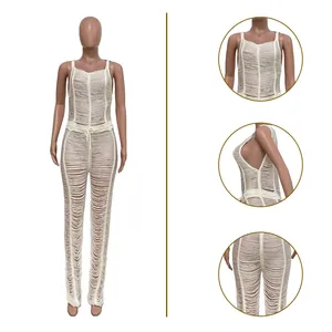 Detailed view of sexy off-white knitted hollow-out leisure jumpsuit for beachwear