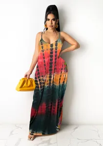 Detailed view of casual bohemian tie-dye cotton maxi dress with spaghetti straps on model