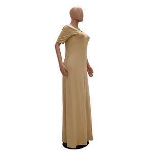 Side view of a minimalist khaki short-sleeved maxi dress for women on a mannequin display