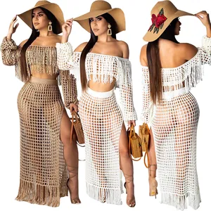 Detailed view of women's crochet mesh fringe beach set in white and beige colors