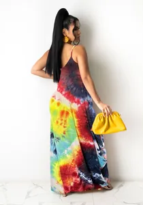 Detail view of a vibrant bohemian tie-dye spaghetti strap maxi dress with a loose fit