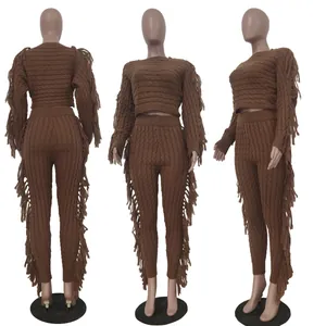 Front, side, and back views of brown knitted two-piece set with long sleeves and tassels