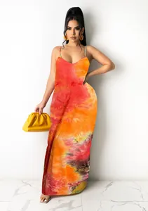 Full-length detail of vibrant orange and red tie-dye maxi slip dress for women