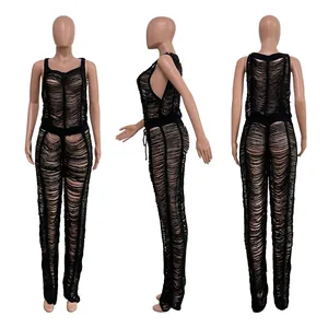 Comprehensive three-way view of a black distressed knit hollow-out beach jumpsuit romper