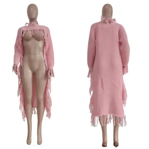Detailed studio shot of a pink long-sleeved fringed knit cardigan sweater for women