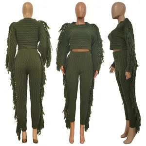 Detail view of women's olive green knit set showing front, back, and side with fringe