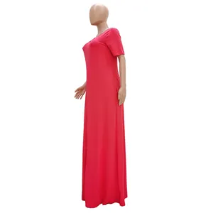 Side view detail of a casual hot pink short-sleeved maxi dress on a mannequin.