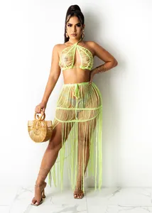 Neon yellow crochet mesh two-piece beach set with fringe skirt and halter top