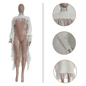 Detail shots of white long cardigan featuring bohemian fringe and tassel knits