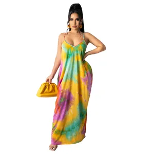 Detailed view of vibrant tie-dye cotton maxi dress with spaghetti straps and loose fit