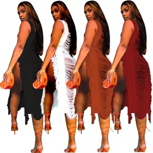 Close-up detail of side-slit lace-up fringe beach dresses available in four vibrant colors
