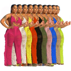 Ensemble deux pièces bikini à franges et pantalon de plage tricoté en plusieurs coloris.