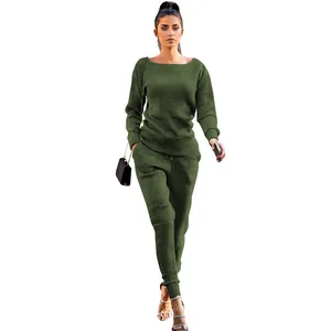 Detailed view showing the ribbed texture and fit of the olive green knitted two-piece set