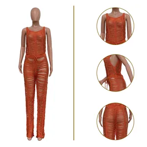 Close-up detail views of orange hollow-out knitted sexy beach jumpsuit for women
