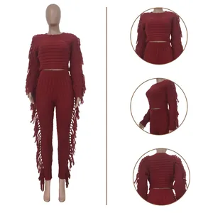 Close-up shots of red knitted two-piece set featuring tassel details and textured fabric