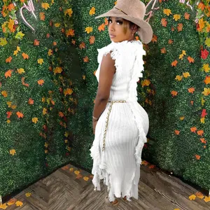 Elegant white sleeveless knit bodycon dress with bohemian fringe and tassel details