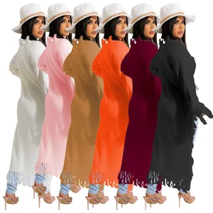Multi-color collection of long-sleeved knit sweaters with elegant fringe detailing