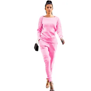 Detail view of pink ribbed knit loungewear set featuring long sleeve top and joggers
