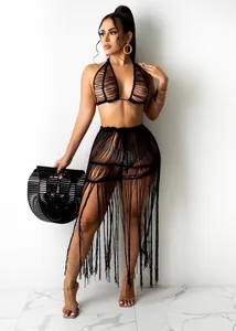 Detailed view of a sexy black knitted mesh fringe tassel beach skirt two-piece set